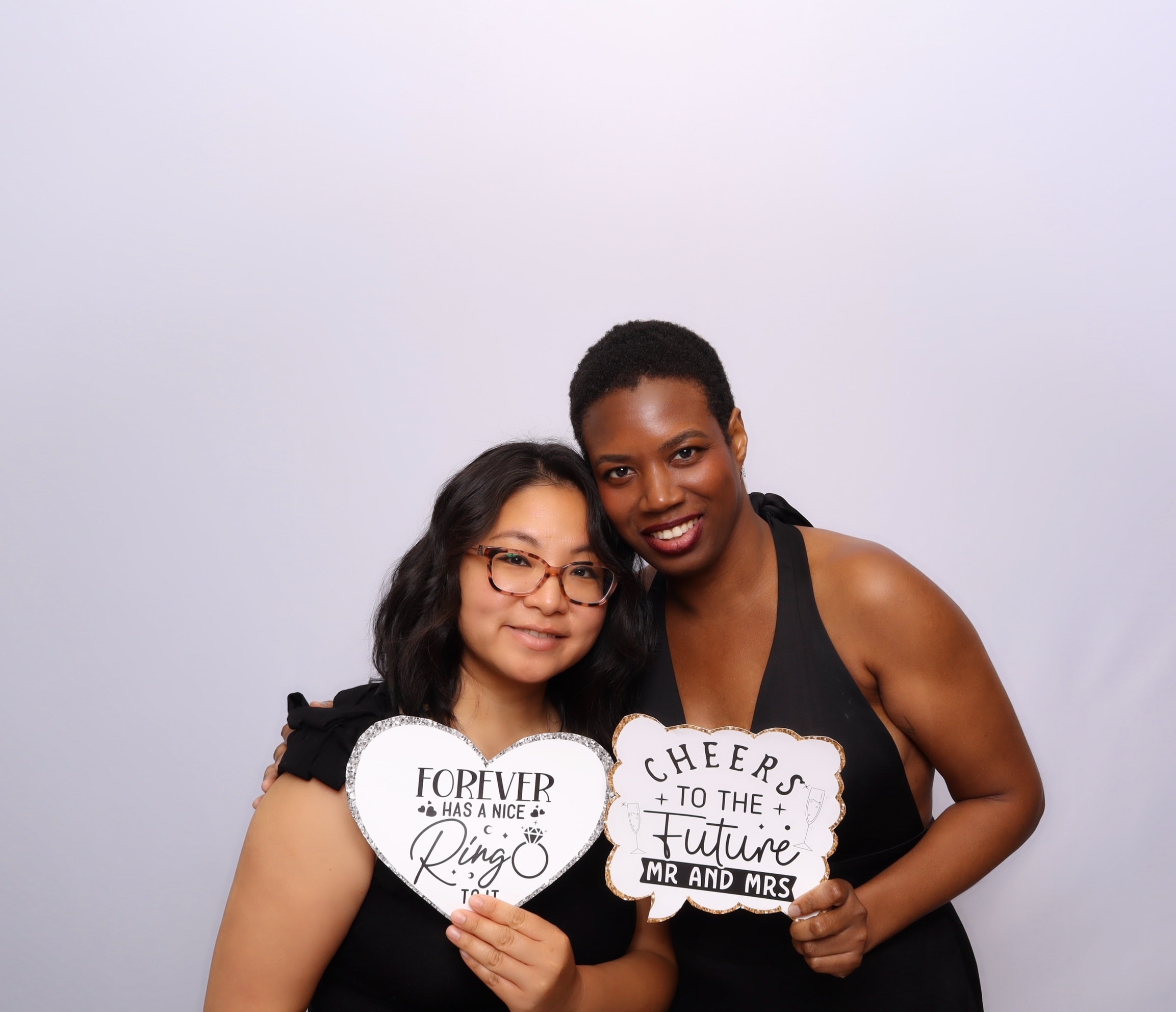 Wedding guests with celebratory signs