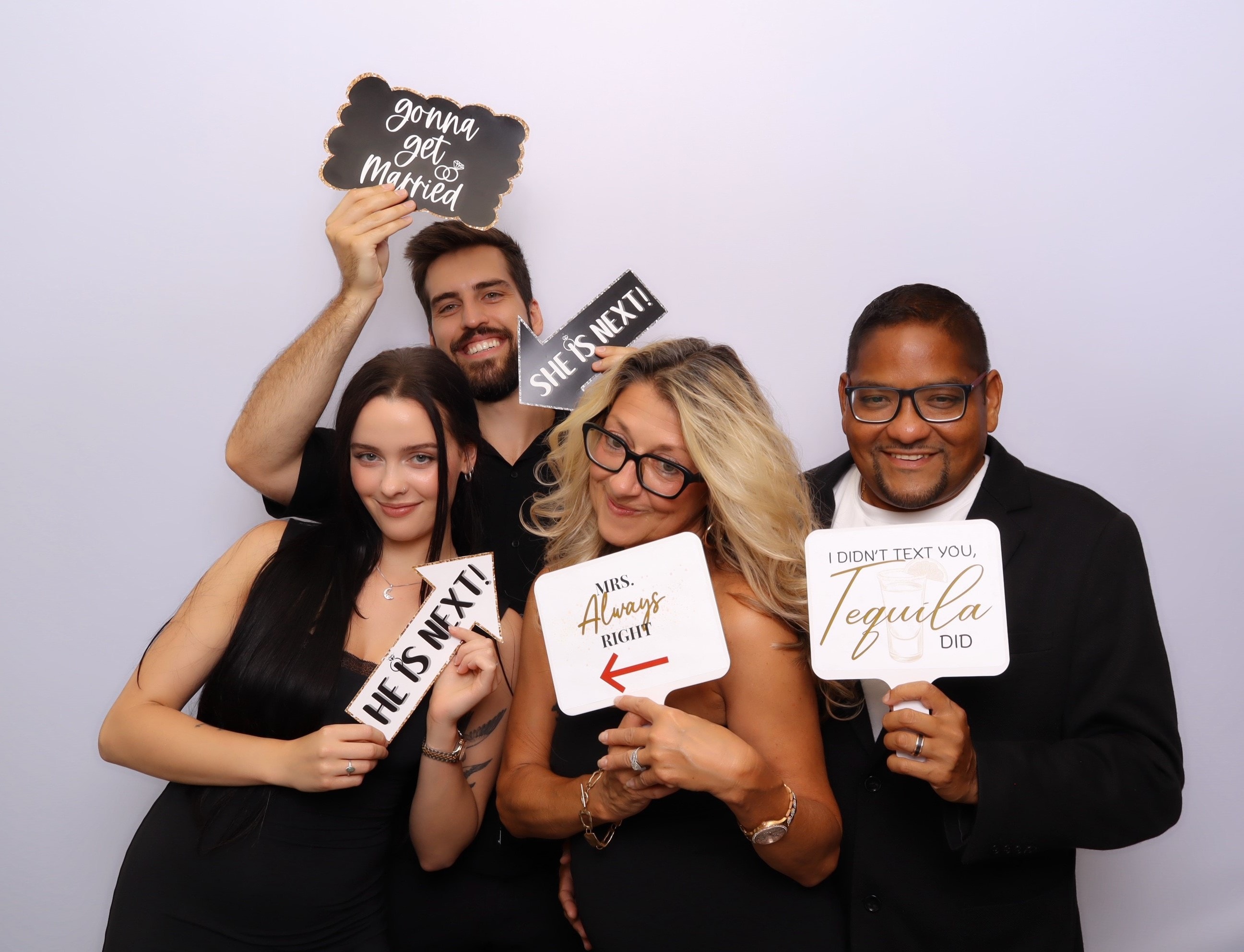 Wedding photo booth group with celebration props